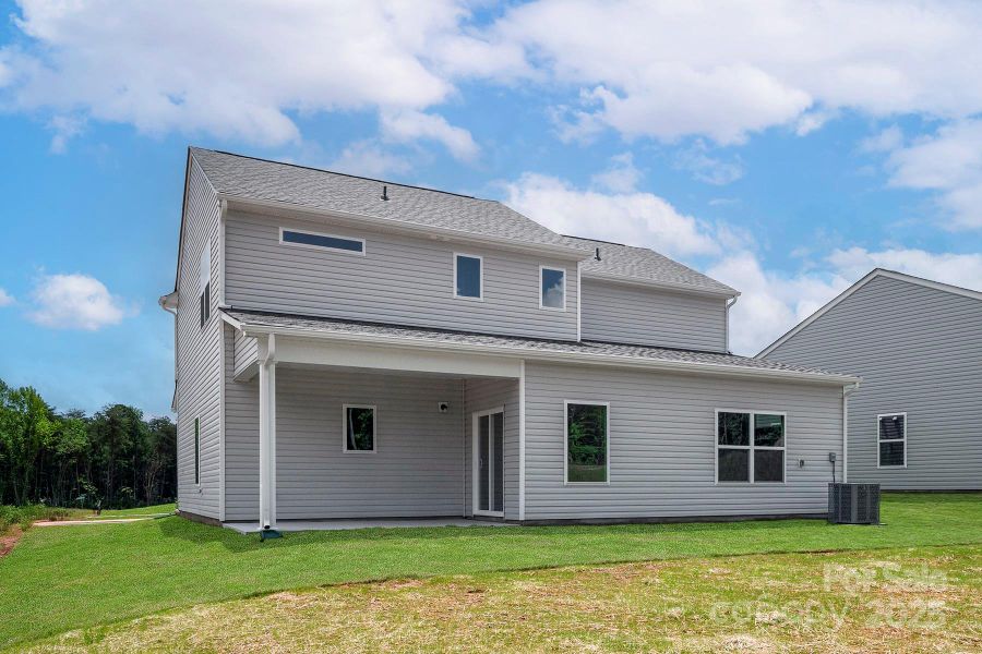 Front exterior of a new home in Ascot Woods, Charlotte, NC, highlighting curb appeal (Image 2).