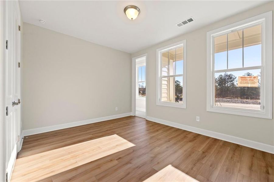 Spacious, unfurnished interior of a new home in Cresswind Georgia at Twin Lakes, Hoschton (Image 26).