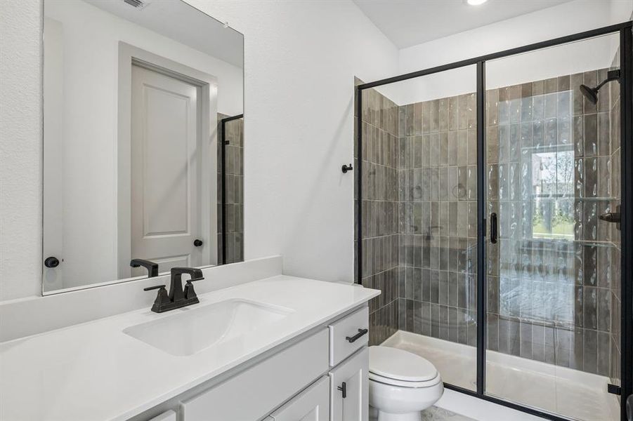 Friends and family will feel right at home in any of the beautifully finished guest baths.