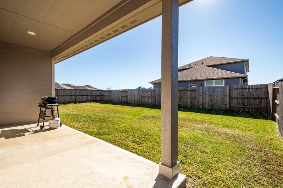 Exterior details and patio area of a home in Heights of Barbers Hill, Baytown (Image 32).