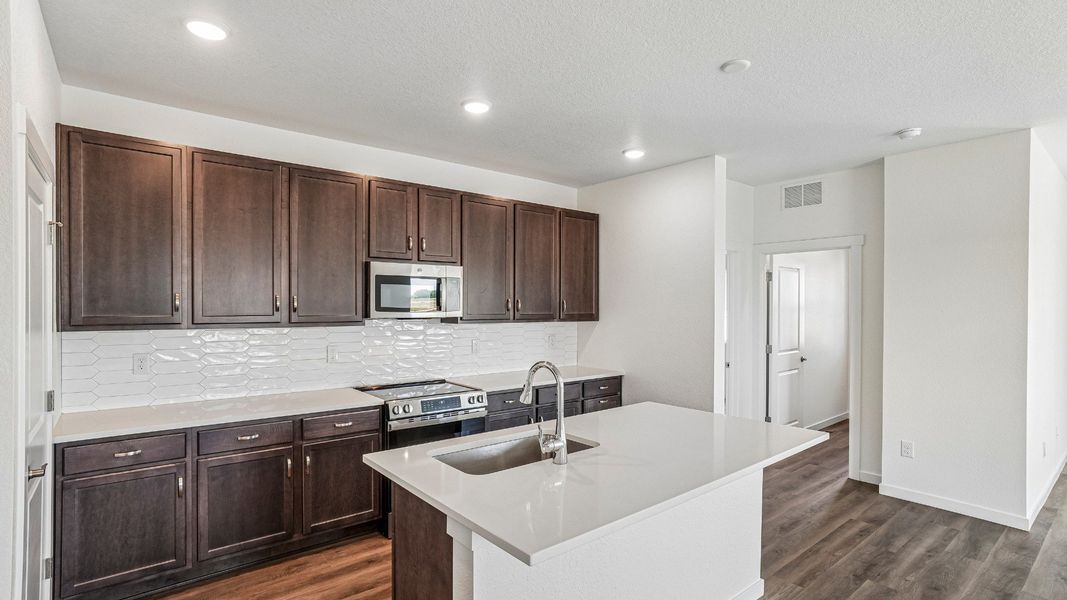 Enjoy everyday moments in this inviting kitchen space