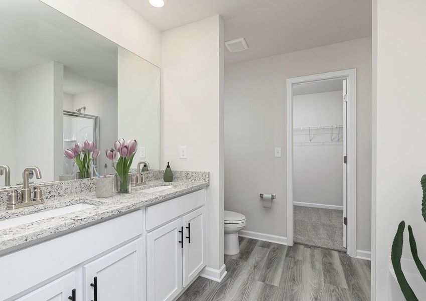 Get ready for your day in the master bathroom