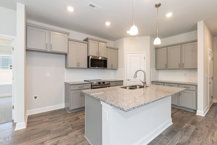 Representative furnished interior of a home built from the Plan 2709 by Adams Homes in Scarlett Place, Bowdon (Image 8). Representative furnished interior of a home built from the Plan 2709 by Adams Homes in Scarlett Place, Bowdon (Image 8).