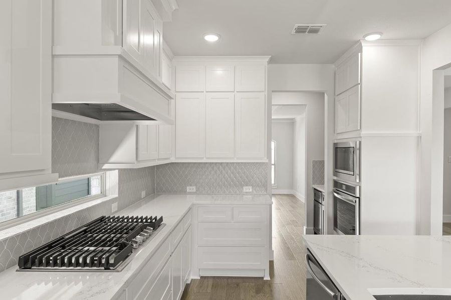 Furnished interior view inside a new home in Valencia on The Lake, Little Elm (Image 2).