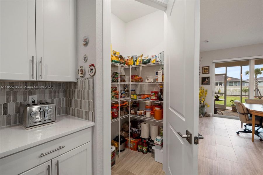 Furnished interior view inside a new home in Del Webb Tradition, Port St. Lucie (Image 22).