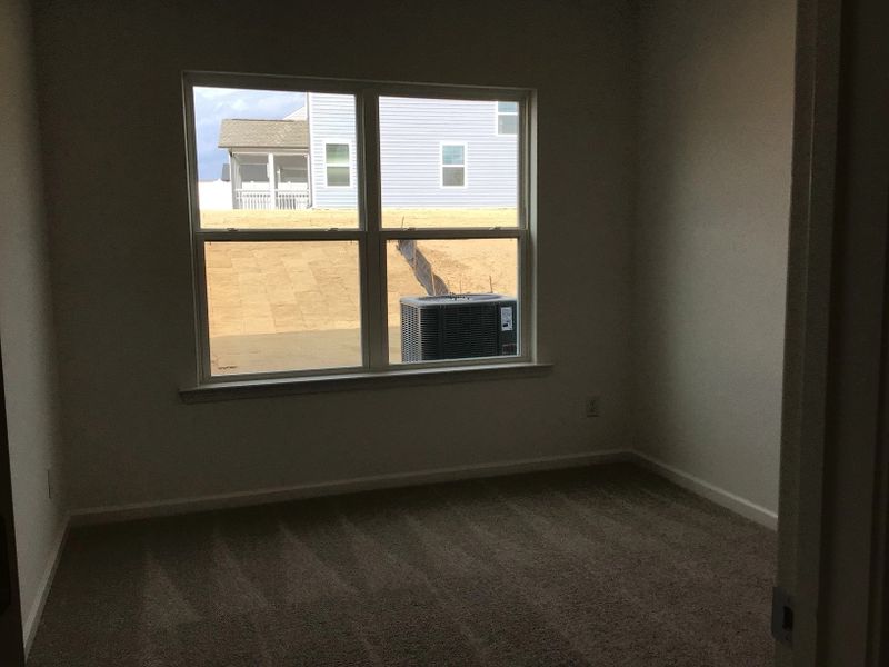 Guest Bed featuring the AW Collection® Coastal - Light-filled and calm, ideal for guests or family.