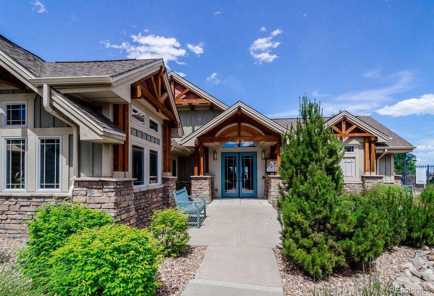 Front exterior of a new home in Chatfield Bluffs, Littleton, CO, highlighting curb appeal (Image 1).