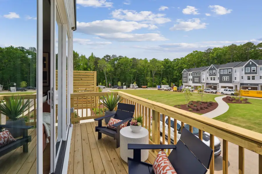 Exterior details and patio area of a home in Twinleaf Townes, Chapel Hill (Image 2). Exterior details and patio area of a home in Twinleaf Townes, Chapel Hill (Image 2).