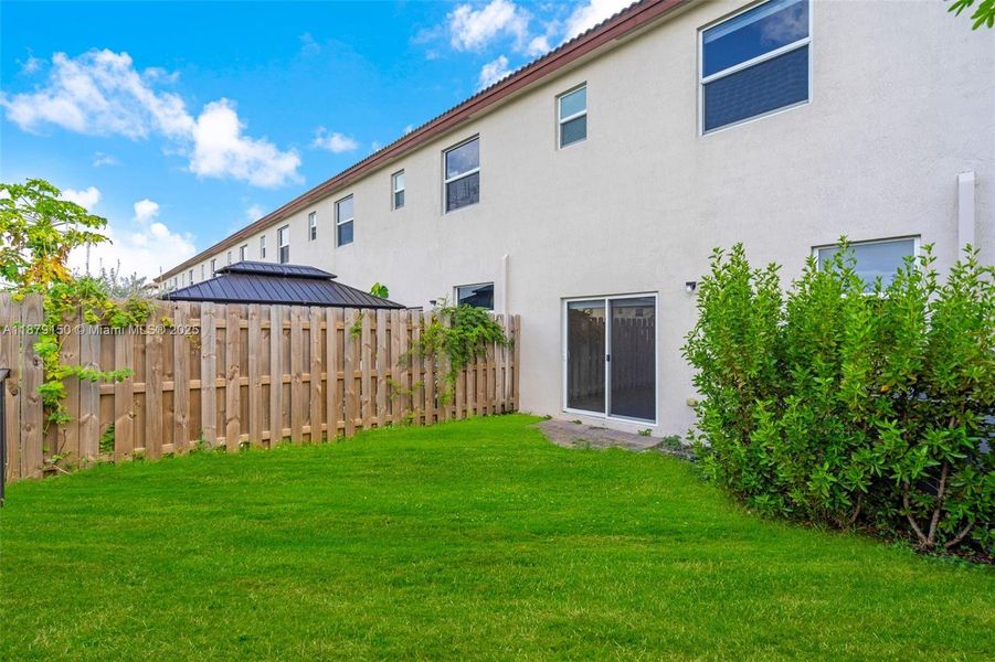 Exterior details and patio area of a home in , Miami (Image 3).