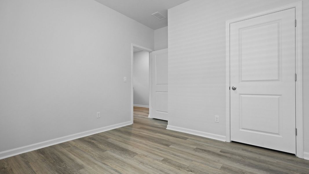Representative unfurnished interior of a home built from the CALI by D.R. Horton in Pineview North, Summerville (Image 15).