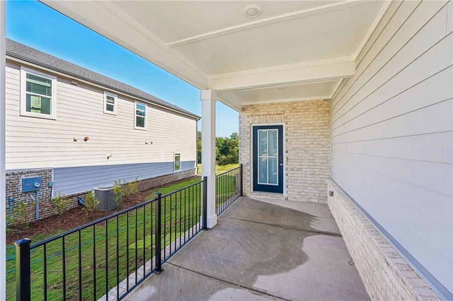 Exterior details and patio area of a home in Hemingway - Reserve Series, Cumming (Image 34).