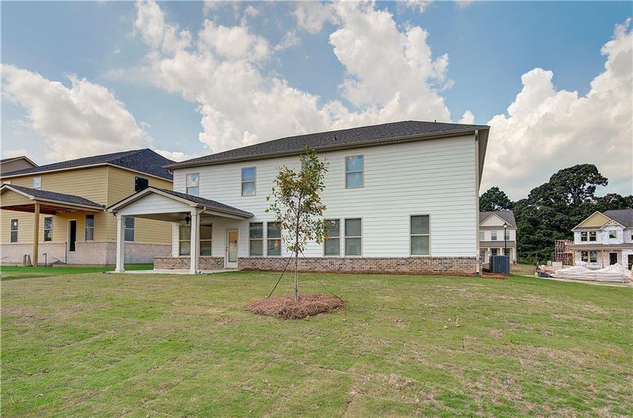 Exterior details and patio area of a home in Adagio, Dacula (Image 3).