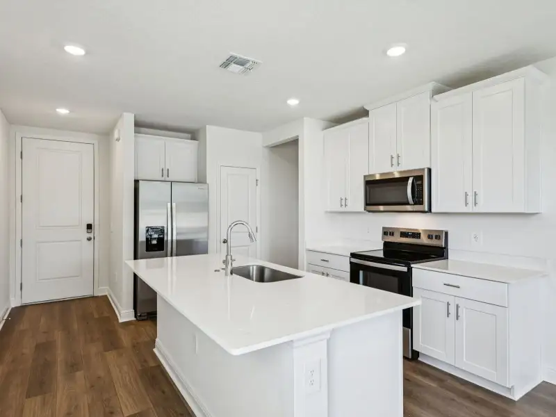Furnished interior view inside a new home in Villamar - Classic Series, Winter Haven (Image 4).