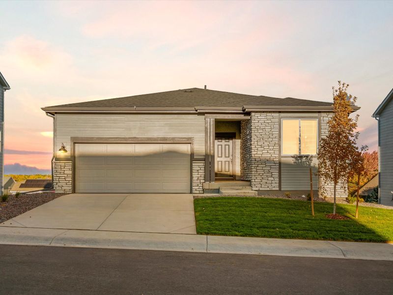 Front exterior of a new home in Poudre Heights: The Lakes Collection, Windsor, CO, highlighting curb appeal (Image 1). Front exterior of a new home in Poudre Heights: The Lakes Collection, Windsor, CO, highlighting curb appeal (Image 1).