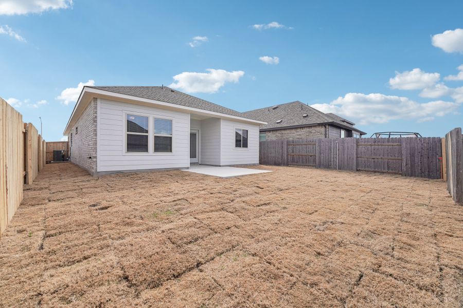 Exterior details and patio area of a home in Crosswinds, Kyle (Image 3).