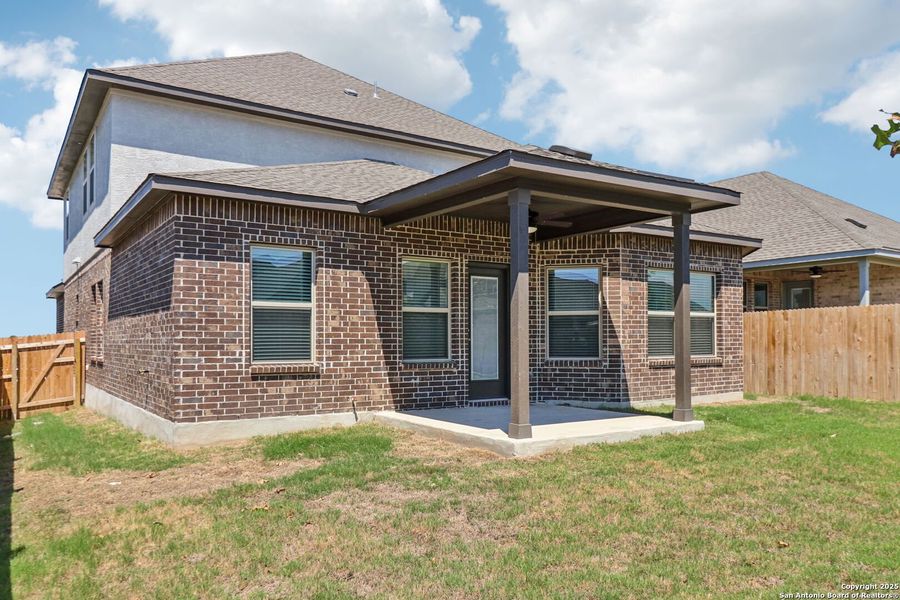 Front exterior of a new home in Arcadia Ridge - Premier Series, San Antonio, TX, highlighting curb appeal (Image 23).