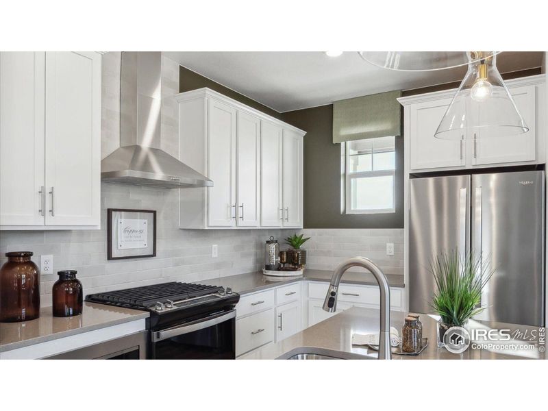 Furnished interior view inside a new home in Villas at Vantage, Berthoud (Image 10).