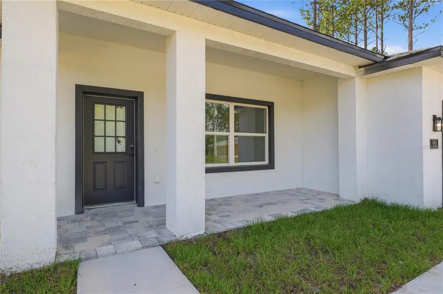 Exterior details and patio area of a home in , Citrus Springs (Image 3). Exterior details and patio area of a home in , Citrus Springs (Image 3).