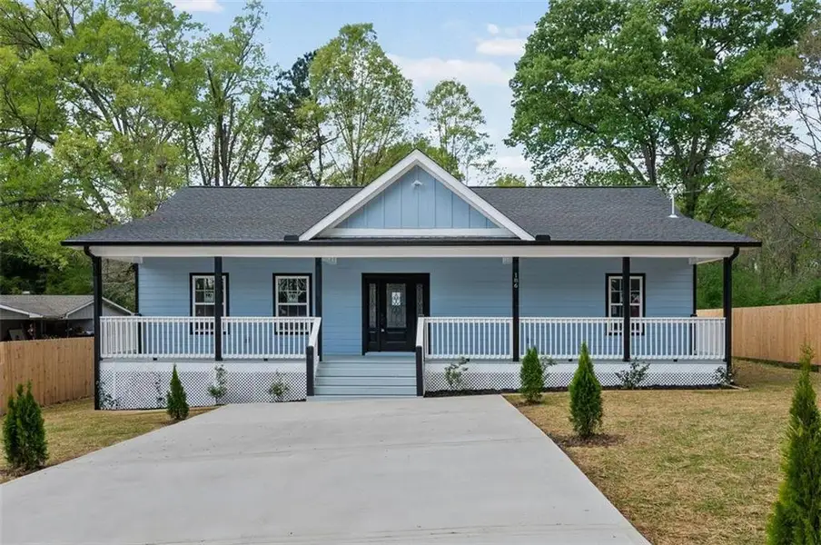 Front exterior of a new home in , Rome, GA, highlighting curb appeal (Image 1). Front exterior of a new home in , Rome, GA, highlighting curb appeal (Image 1).