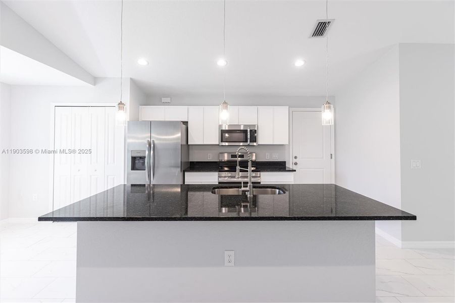 Furnished interior view inside a new home in , Lehigh Acres (Image 5). Furnished interior view inside a new home in , Lehigh Acres (Image 5).