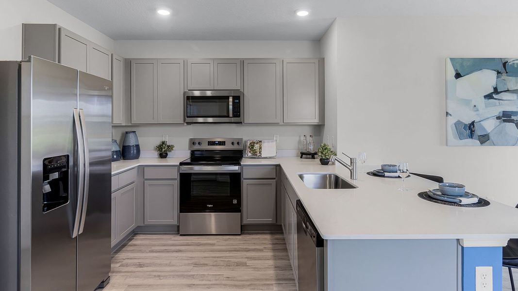 Representative furnished interior of a home built from the ALLEX by D.R. Horton in Summerlin at Hawthorne Ranch, Lakeland (Image 8).