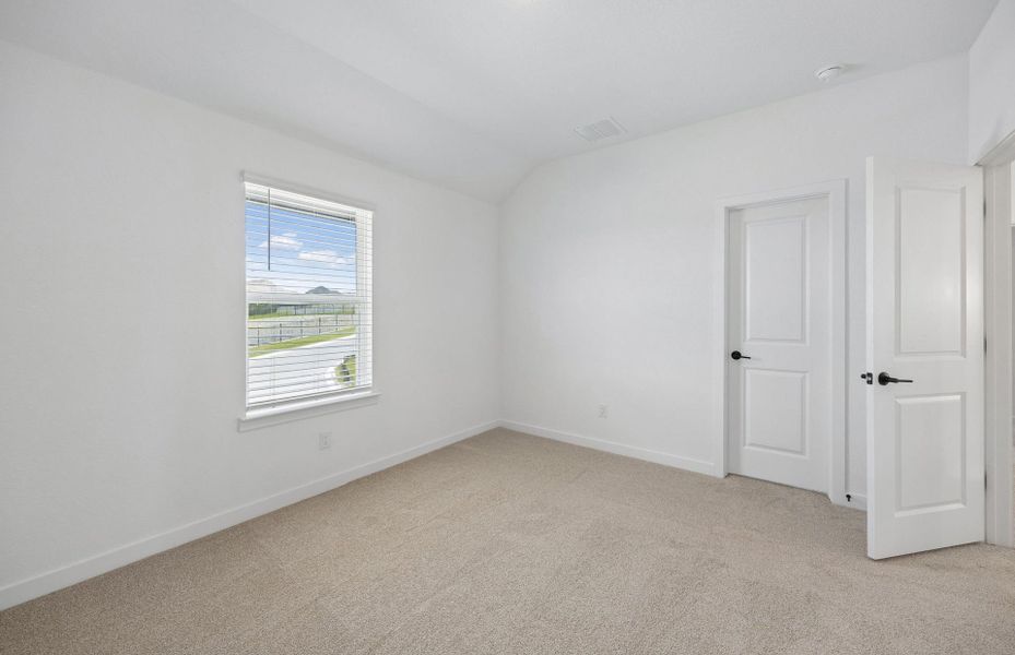 Representative unfurnished interior of a home built from the Wheeler by Pulte Homes in West Cypress Hills, Spicewood (Image 18).