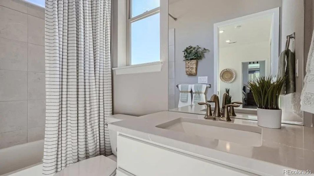 Furnished interior view inside a new home in Vermilion Creek: The Skyline Collection, Centennial (Image 13).