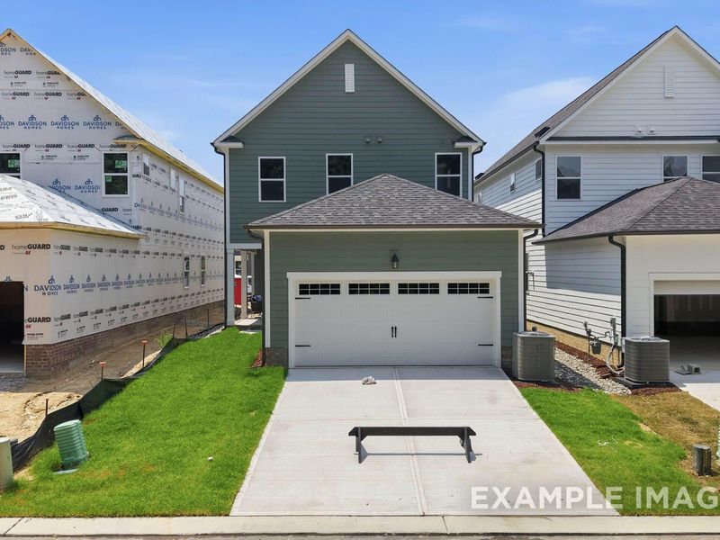 Front exterior of a new home in Forestville Yard, Knightdale, NC, highlighting curb appeal (Image 2). Front exterior of a new home in Forestville Yard, Knightdale, NC, highlighting curb appeal (Image 2).