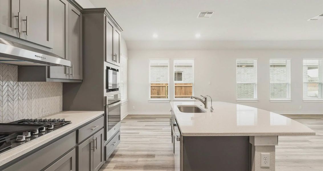Representative furnished interior of a home built from the Connor by Chesmar Homes in Meyer Ranch, New Braunfels (Image 6).
