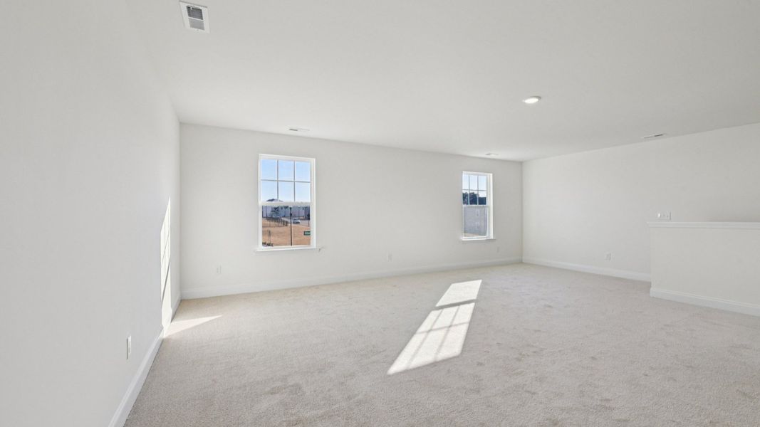 Representative furnished interior of a home built from the Chelsea by DRB Homes in Jasper Landing, Four Oaks (Image 17).