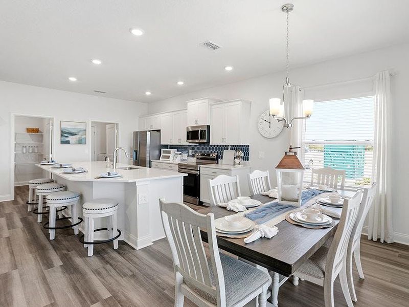 Dine in the sunny cafe, or at the island - Shelby II by Highland Homes