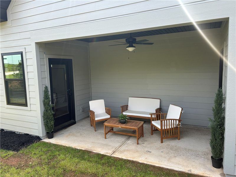 Exterior details and patio area of a home in Edwards Ridge, Central (Image 3).