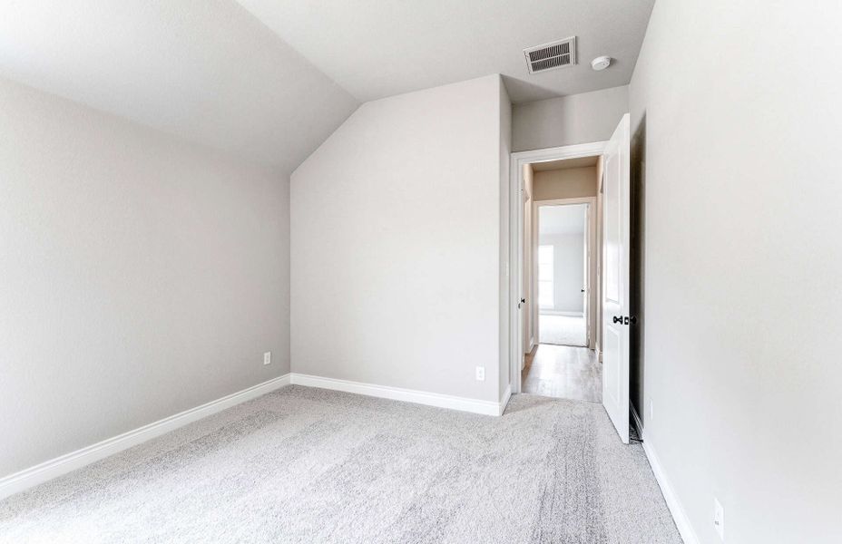 Representative unfurnished interior of a home built from the 2870 by Ravenna Homes in The Woodlands Hills 65′, Willis (Image 36). Representative unfurnished interior of a home built from the 2870 by Ravenna Homes in The Woodlands Hills 65′, Willis (Image 36).