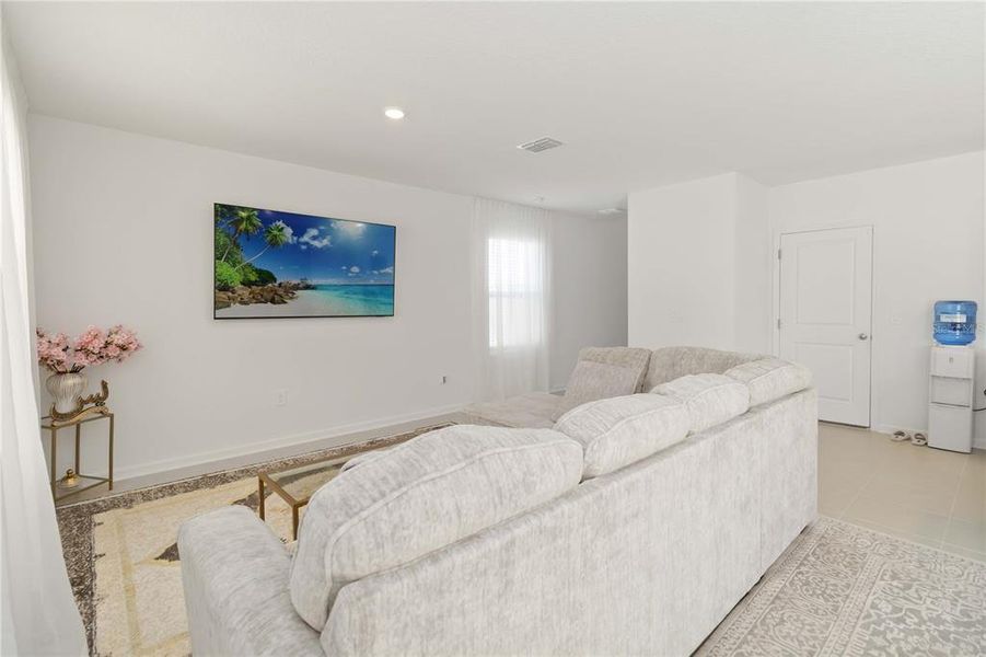 Furnished interior view inside a new home in Peace Creek Reserve: Manor Key Collection, Winter Haven (Image 10).