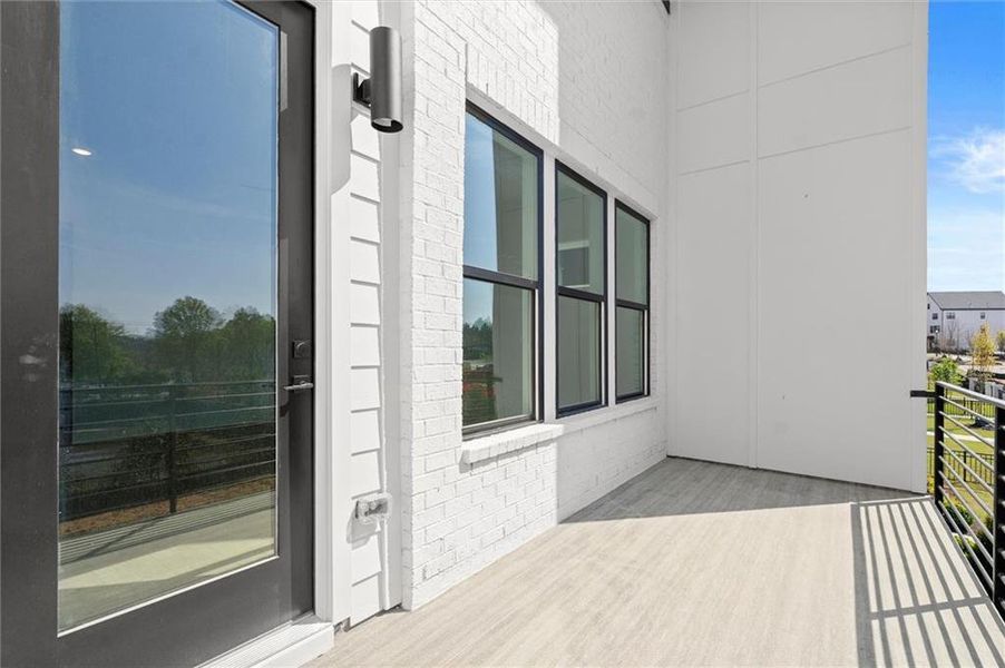 Exterior details and patio area of a home in The Gathering – Alpharetta, Alpharetta (Image 4).