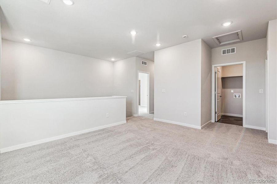 Spacious, unfurnished interior of a new home in Floret Collection at Alder Creek, Parker (Image 13).