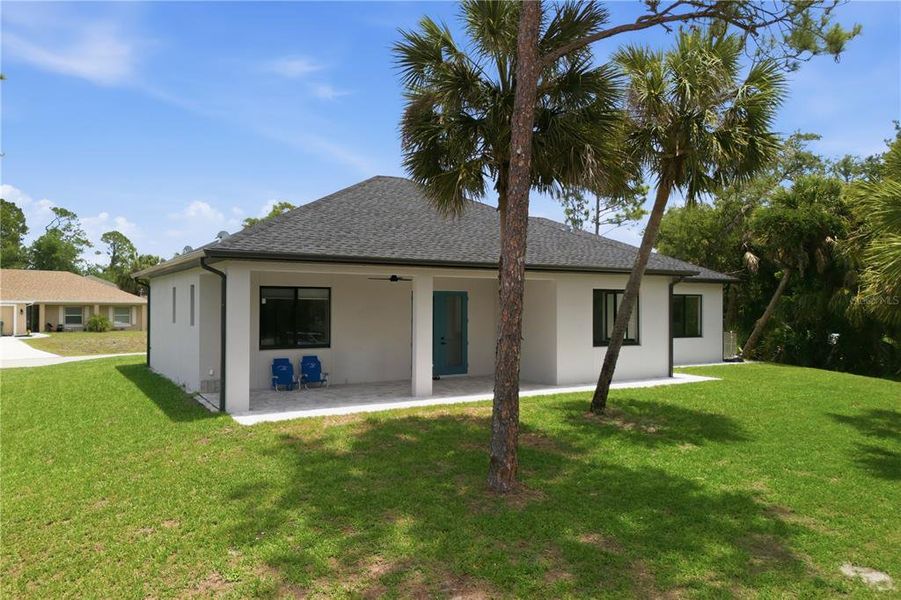 Exterior details and patio area of a home in , North Port (Image 32).