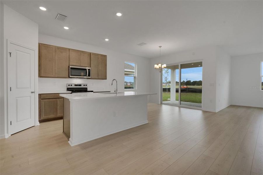 Furnished interior view inside a new home in Annabelle Estates, Winter Haven (Image 12).