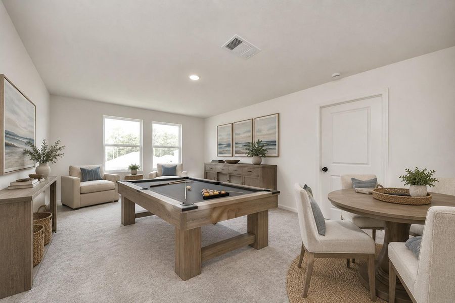 This is a generous sized virtually staged game room