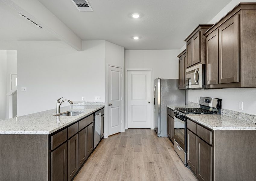 The kitchen has stainless-steel appliances.