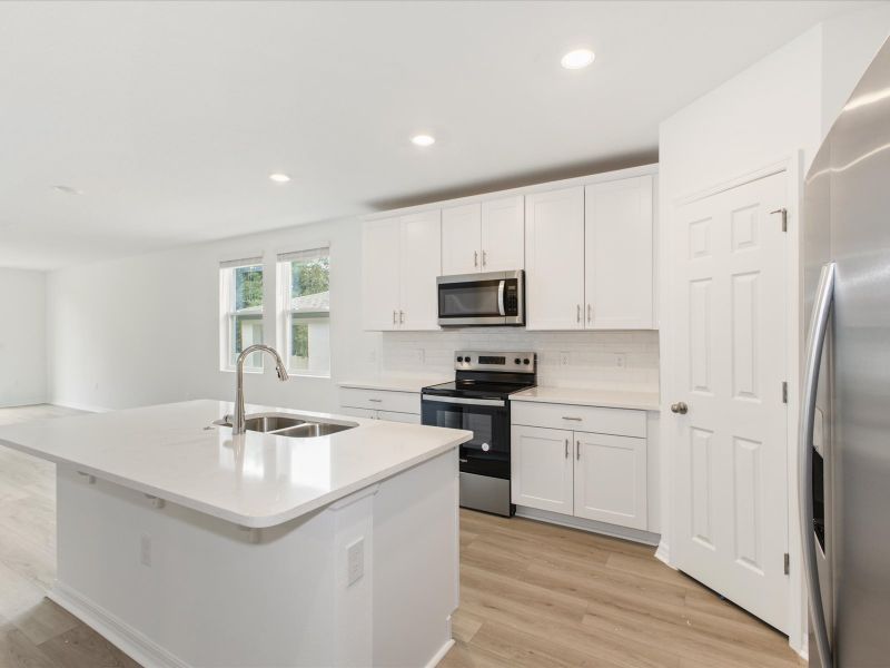 Kitchen in the Daphne floorplan at 2343 White Tail Street