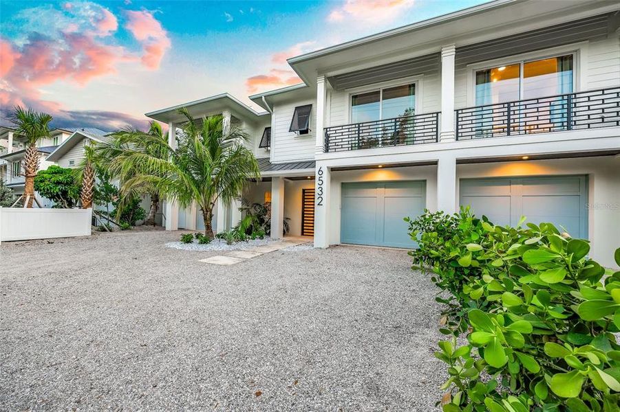 Front exterior of a new home in , Sarasota, FL, highlighting curb appeal (Image 26).