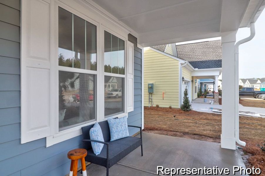 Exterior details and patio area of a home in Homecoming, Ravenel (Image 1).