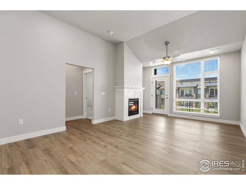 Bright, open floor plan w/ luxury vinyl extended into living room