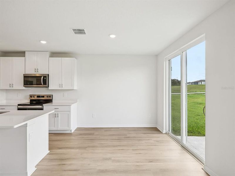 Spacious, unfurnished interior of a new home in The Reserve at Van Oaks, Auburndale (Image 18).