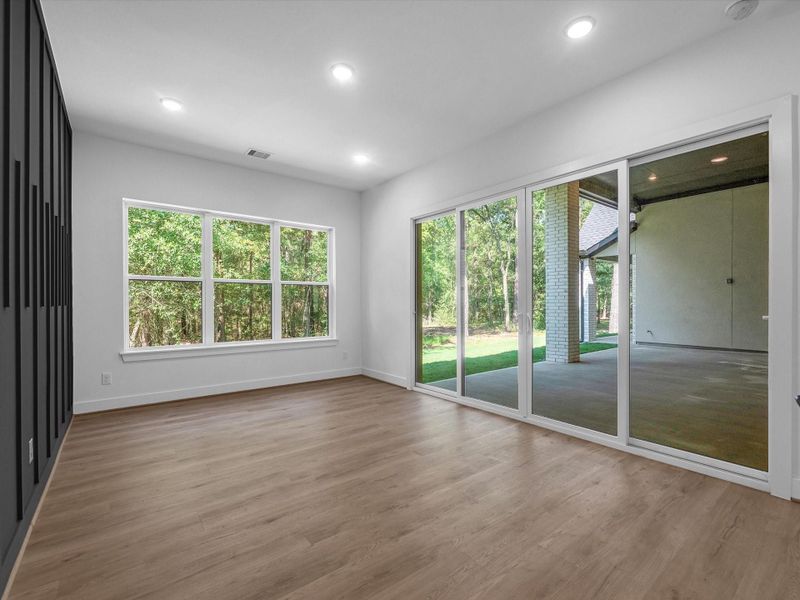Flex room could be another office, reading room, office or game room that opens to the outdoor patio
