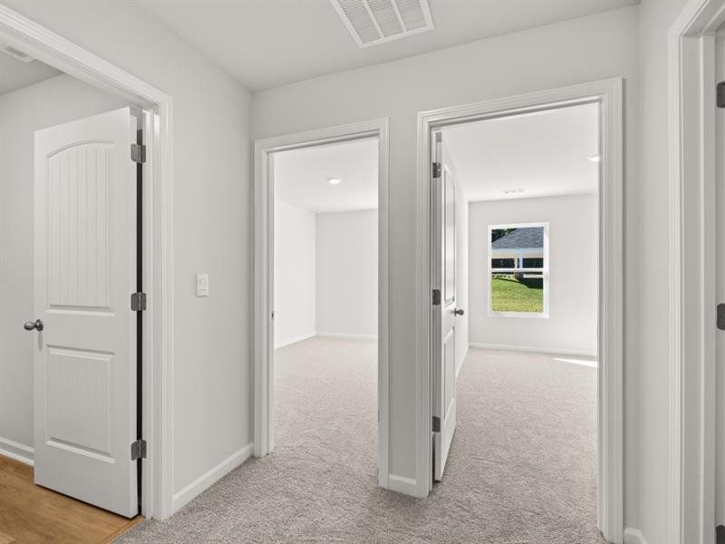 Spacious, unfurnished interior of a new home in Waypoint, Flowery Branch (Image 15).