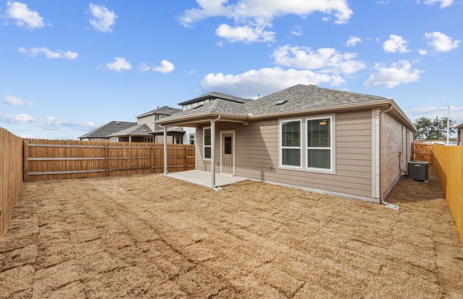 Exterior details and patio area of a home in Crosswinds, Kyle (Image 20).