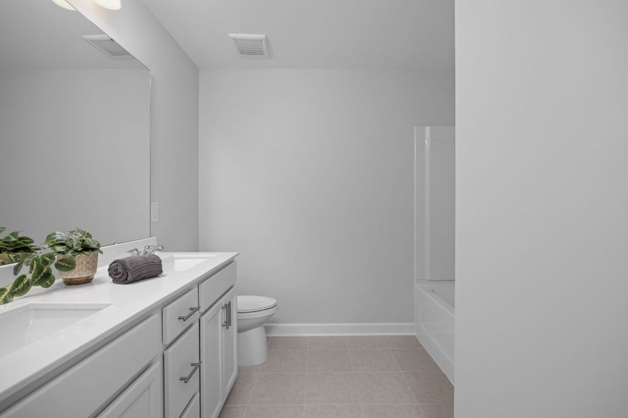 Representative furnished interior of a home built from the The Warren by Davidson Homes LLC in Gregory Village Townhomes, Lillington (Image 19).