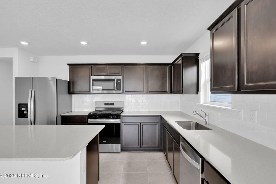 Furnished interior view inside a new home in Wells Landing, Jacksonville (Image 10).